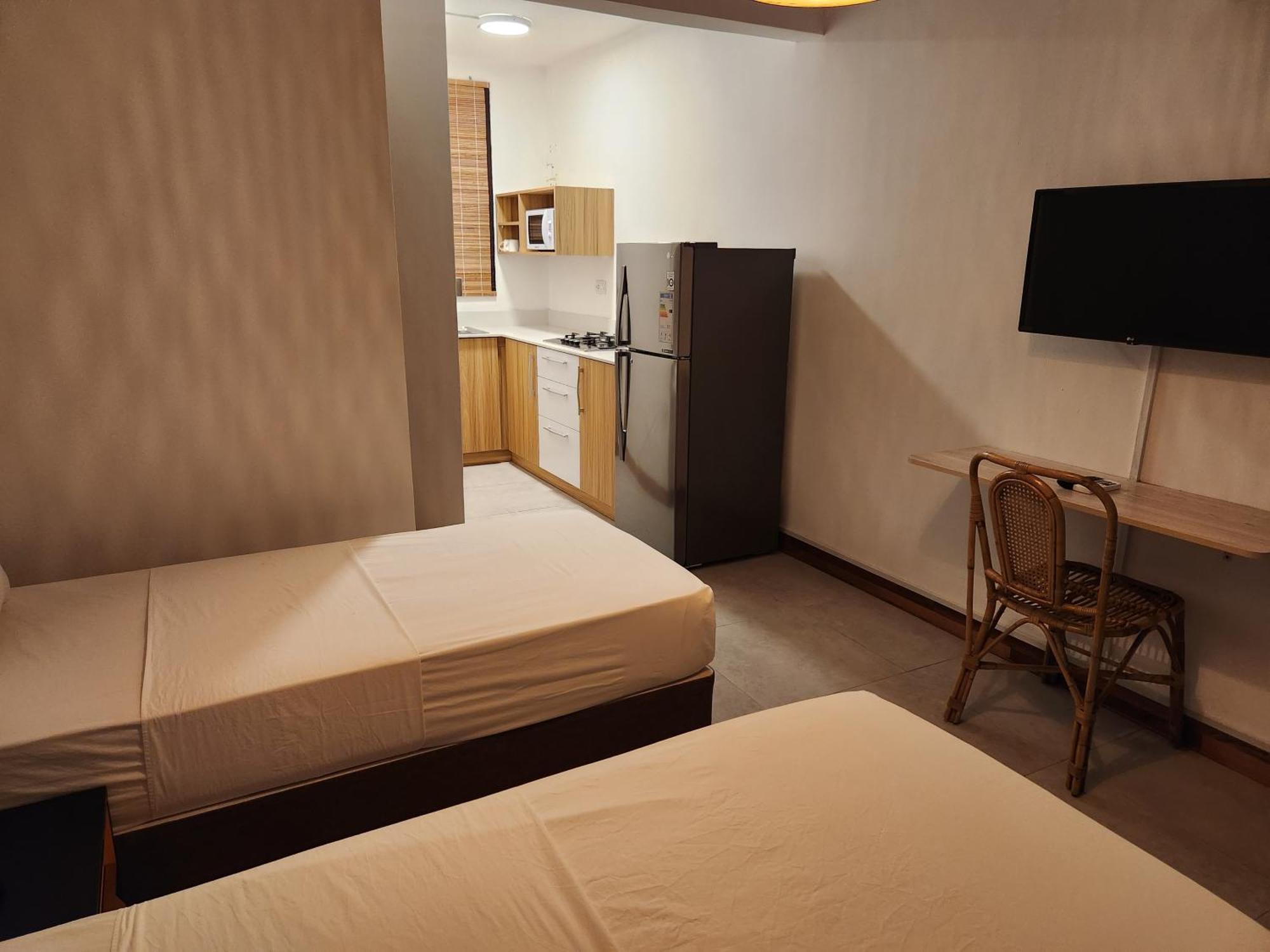 La Perla Holiday Apartments Pereybere Beach Room photo