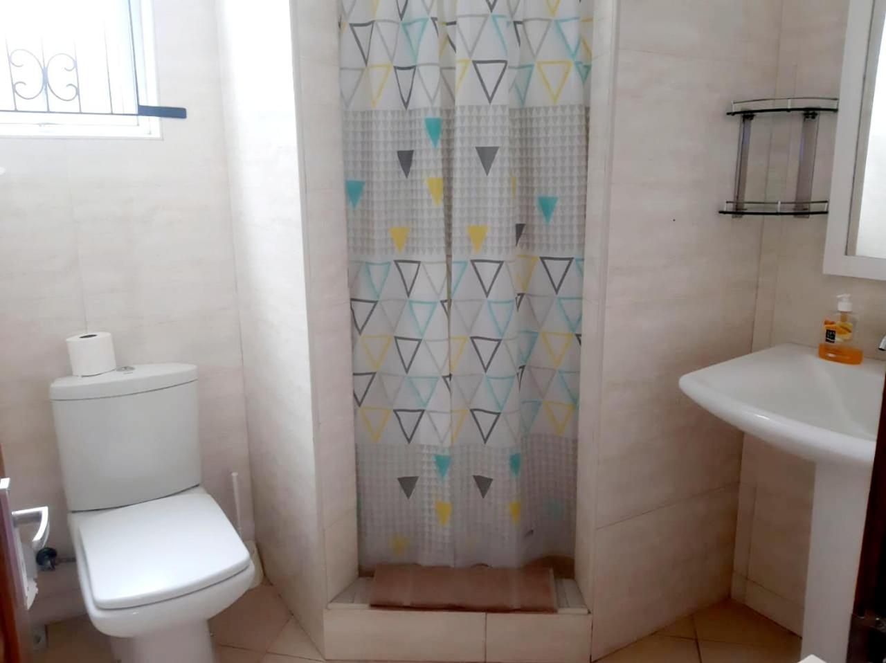 La Perla Holiday Apartments Pereybere Beach Room photo