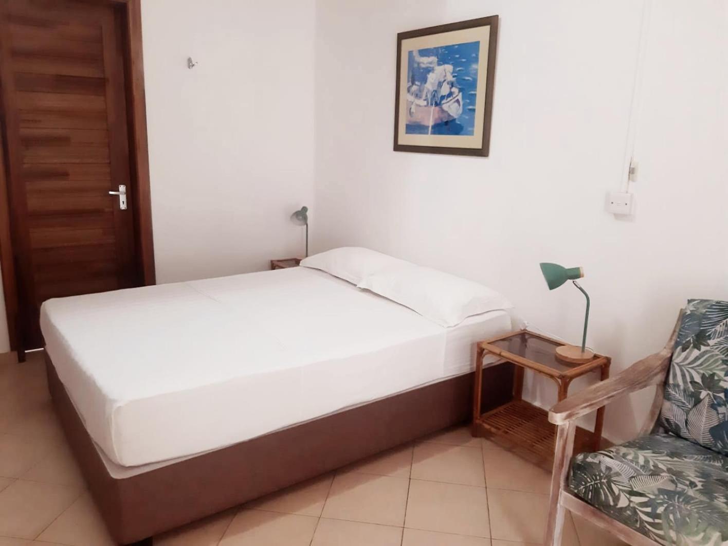La Perla Holiday Apartments Pereybere Beach Room photo