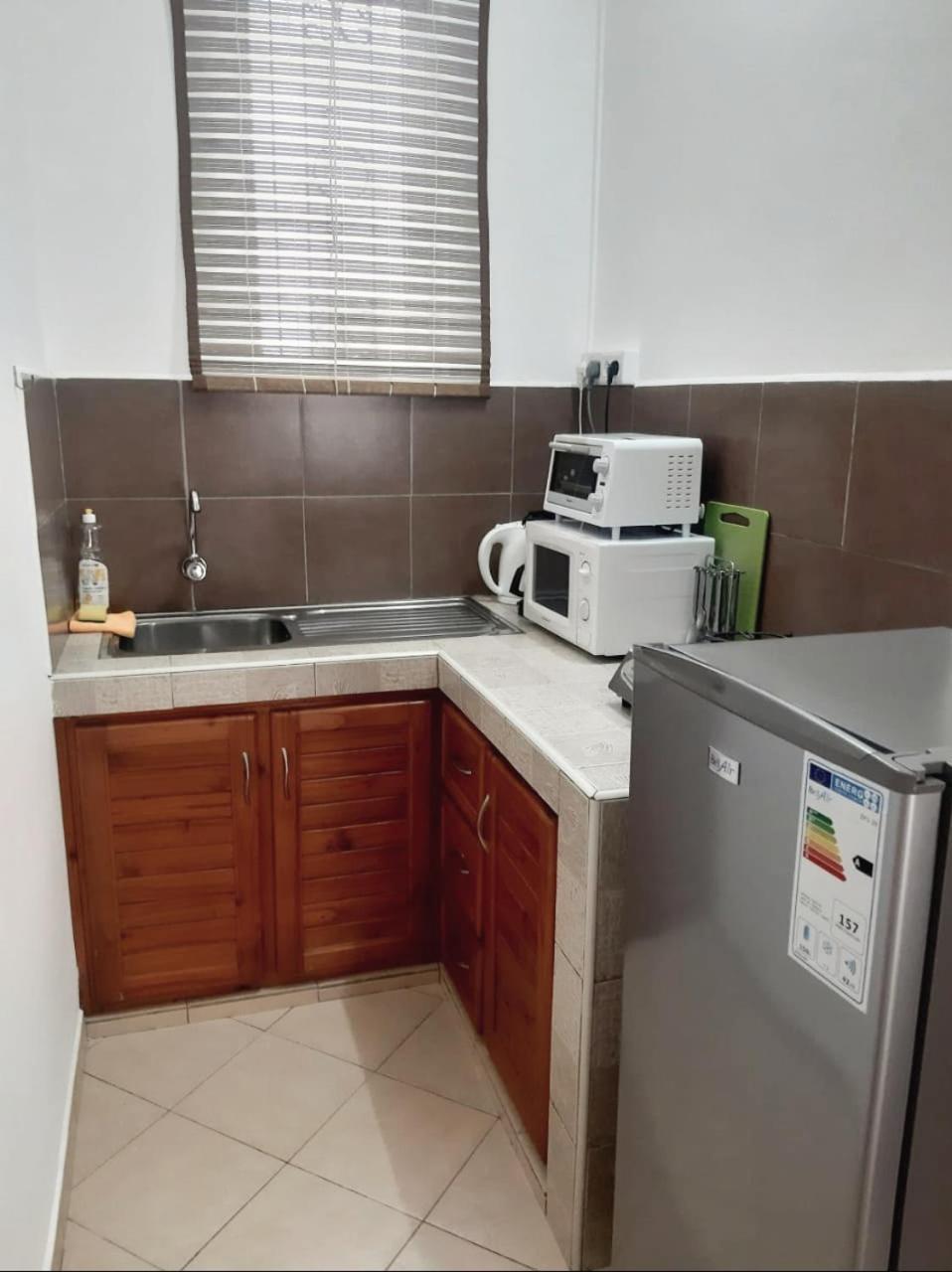 La Perla Holiday Apartments Pereybere Beach Room photo